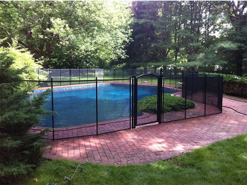 Life Saver removable mesh pool fence installed in Bedford, NH Life Saver Pool Fence New England